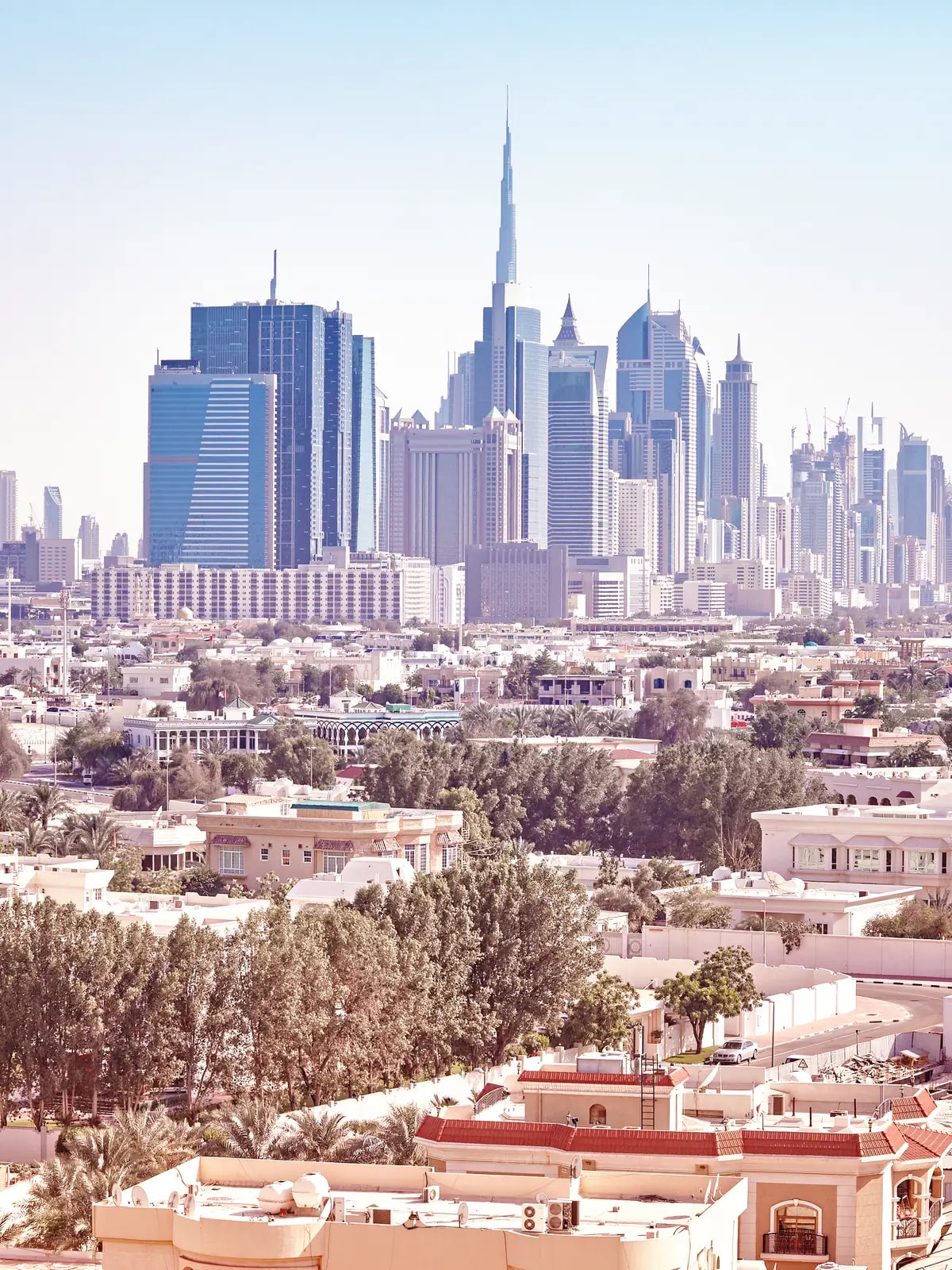 Older central Dubai villas with the Burj Khalifa behind, the kind of homes in Al Wasl we automate