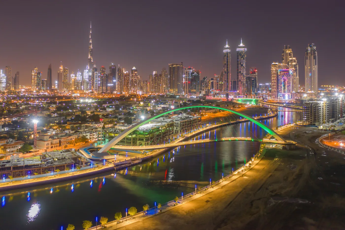Downtown Dubai skyline and Dubai Water Canal at night