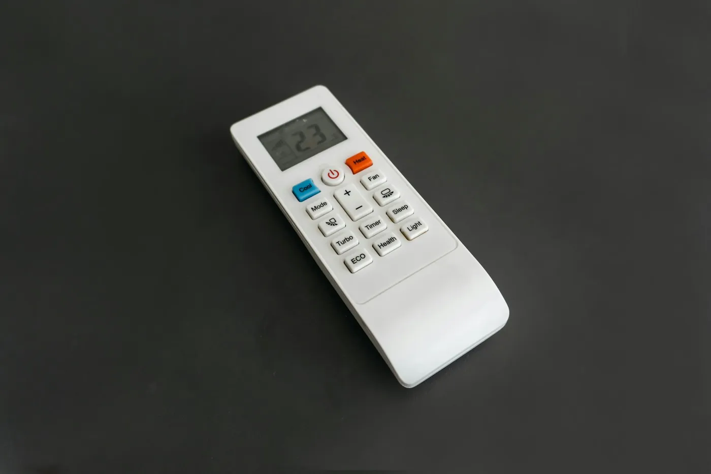 AC remote control set to 23 degrees with cool, eco and turbo mode buttons